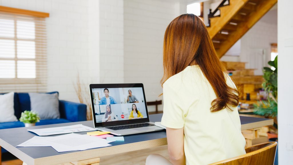 Host a Workshop or Webinar - A business owner conducting a webinar