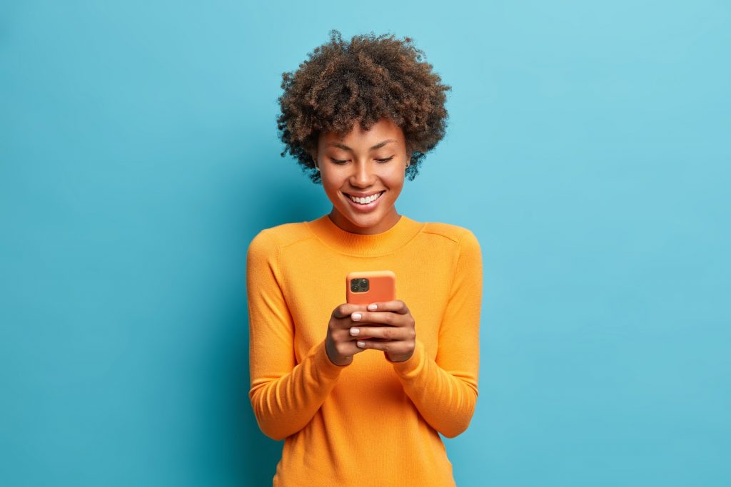 Woman using affordable marketing ideas for small business