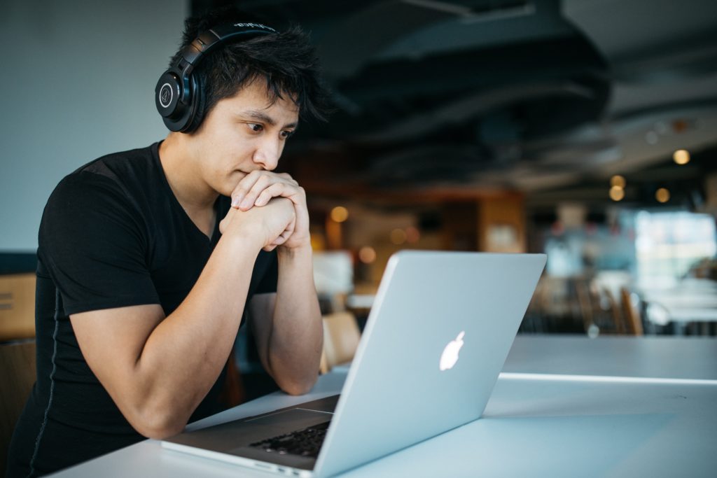 Steps to Building a Career in B.C.’s Creative Industry - Young guy with Macbook